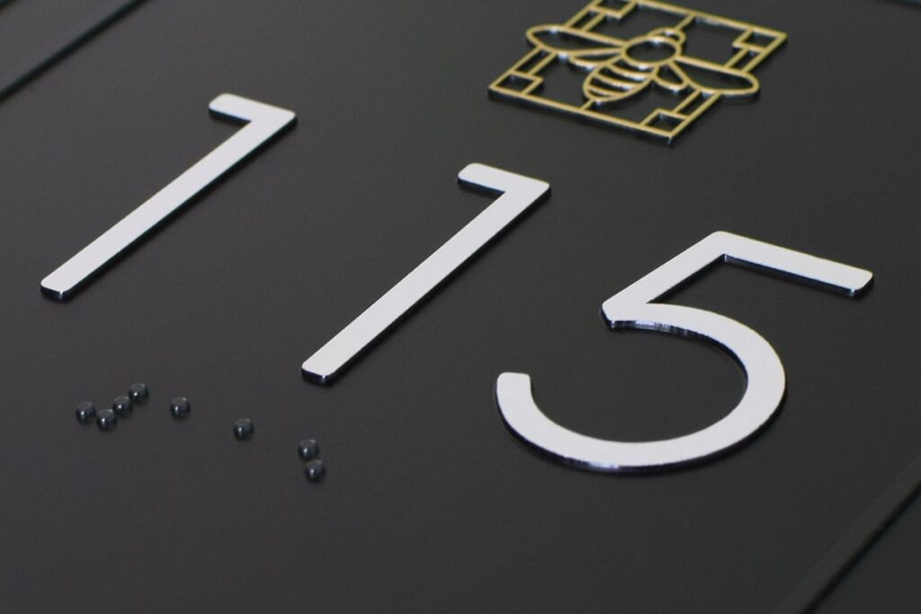 Novacryl PT Series Black PETG numbered room sign