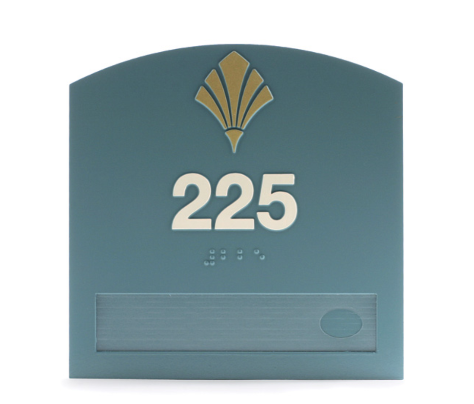 Tactile sign with integrated braille, room numbers, and a routed window for changeable inserts, ideal for flexible information display.