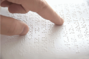 User learning to translate braille with the Braille Academy App on a mobile device.