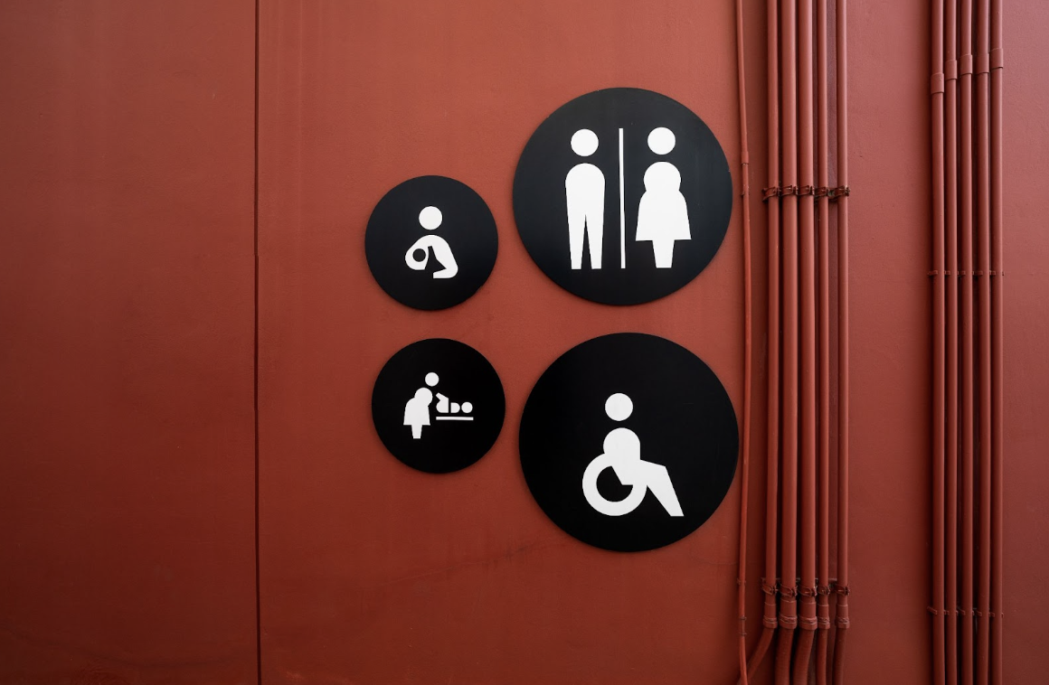 Adhesive-to-substrate matrix used for mounting ADA-compliant signs, ensuring secure installation on various surfaces while meeting accessibility standards.
