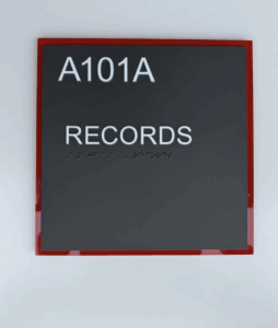 A1091A Records: Rocky Ford School, Rocky Ford Colorado, ADA compliant signage innovations by FASTSIGNS of DTC, CO.