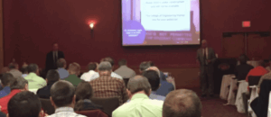 ADA accessibility code education at a conference for sign architects.