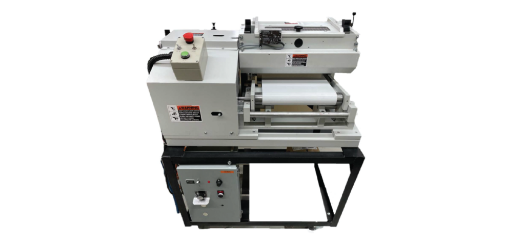 The ColorPro Ink Tipping Machine for color application.